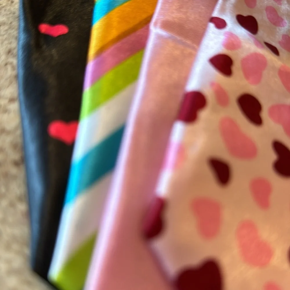 Tie 10 inch unisex ties set of 4. Attached elastic cord goes under the collar